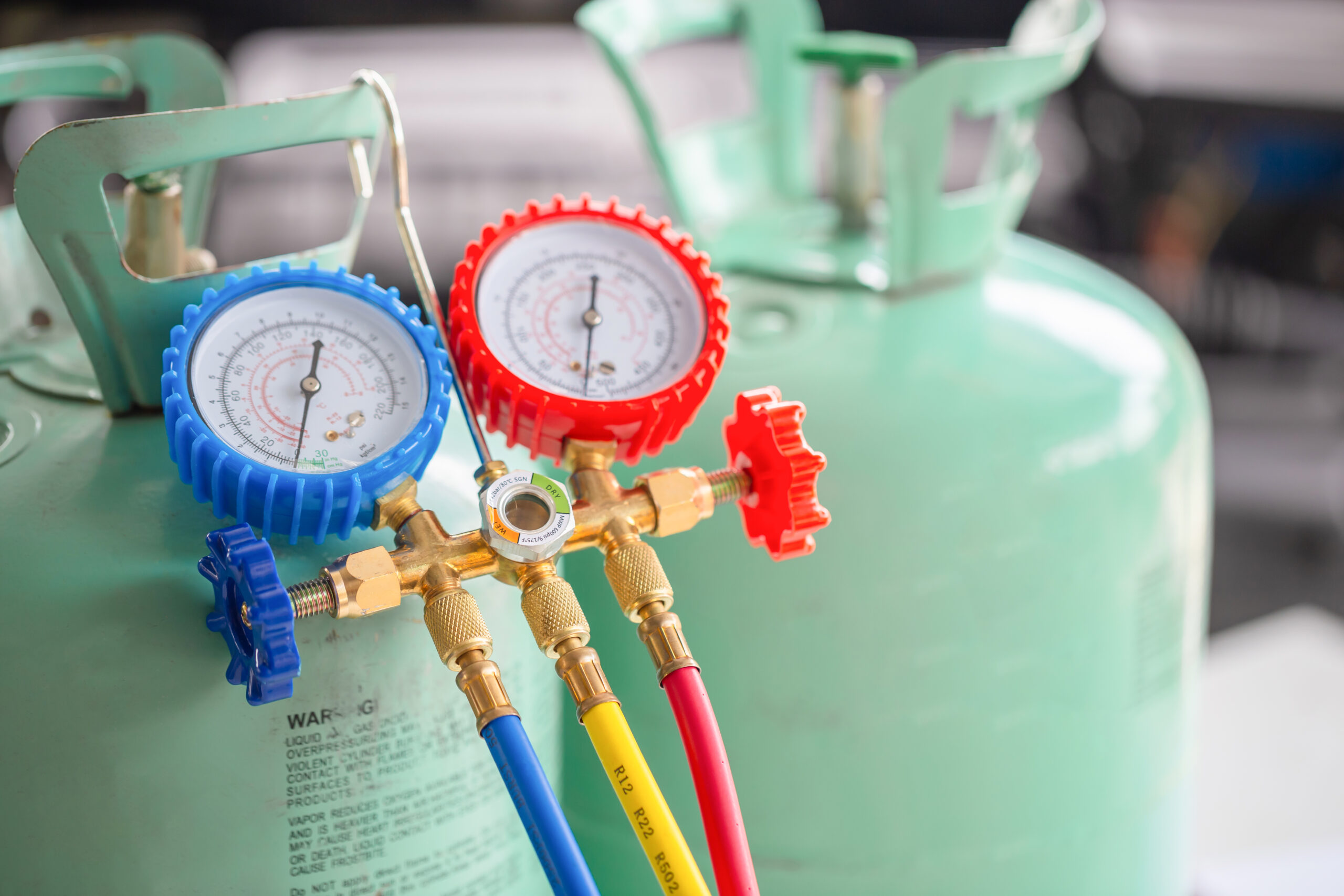 Manifold gauge and R22 refrigerant tanks